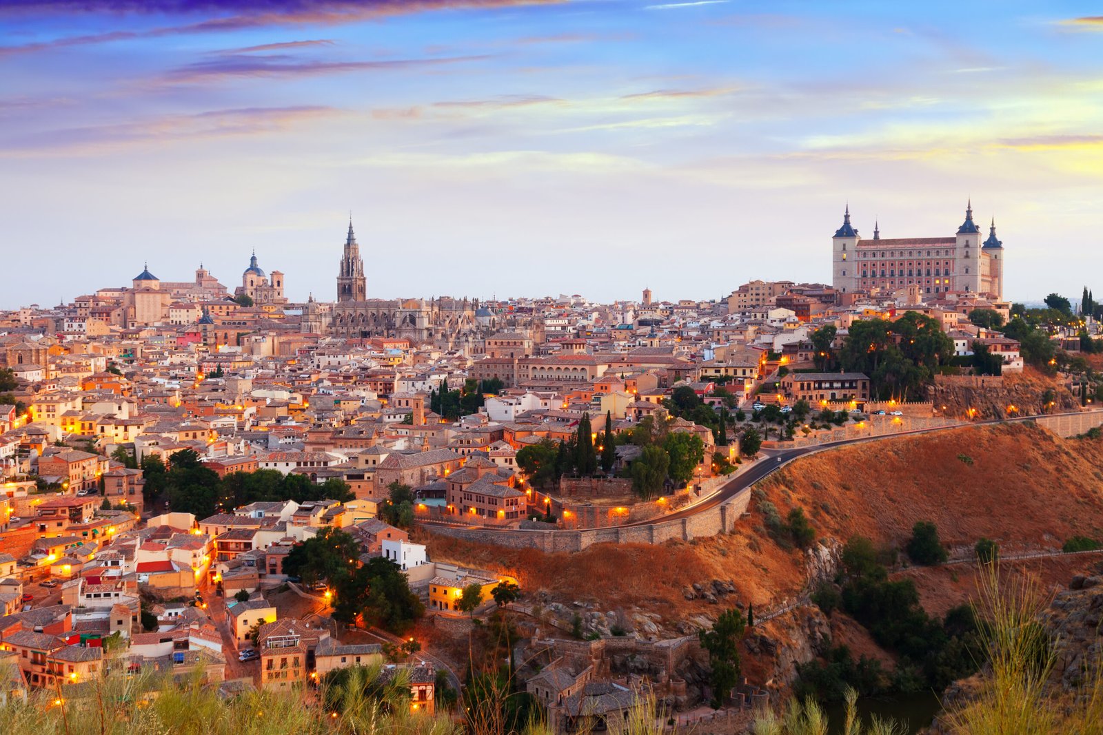 Toledo from hill in summer morning. Castile–La Mancha, Spain
